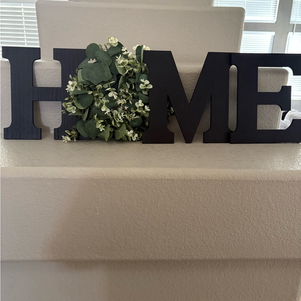Black HOME Sign with Greenery